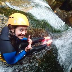 a Girl taking part in a body rafting
